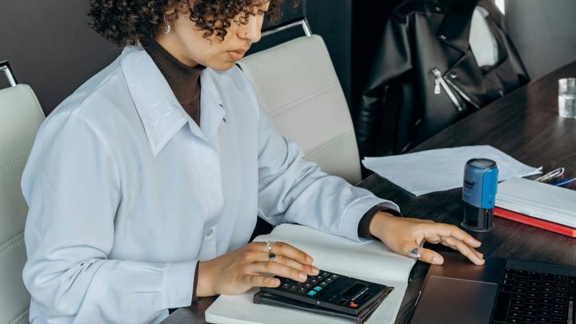 Small business women working on tax documents.